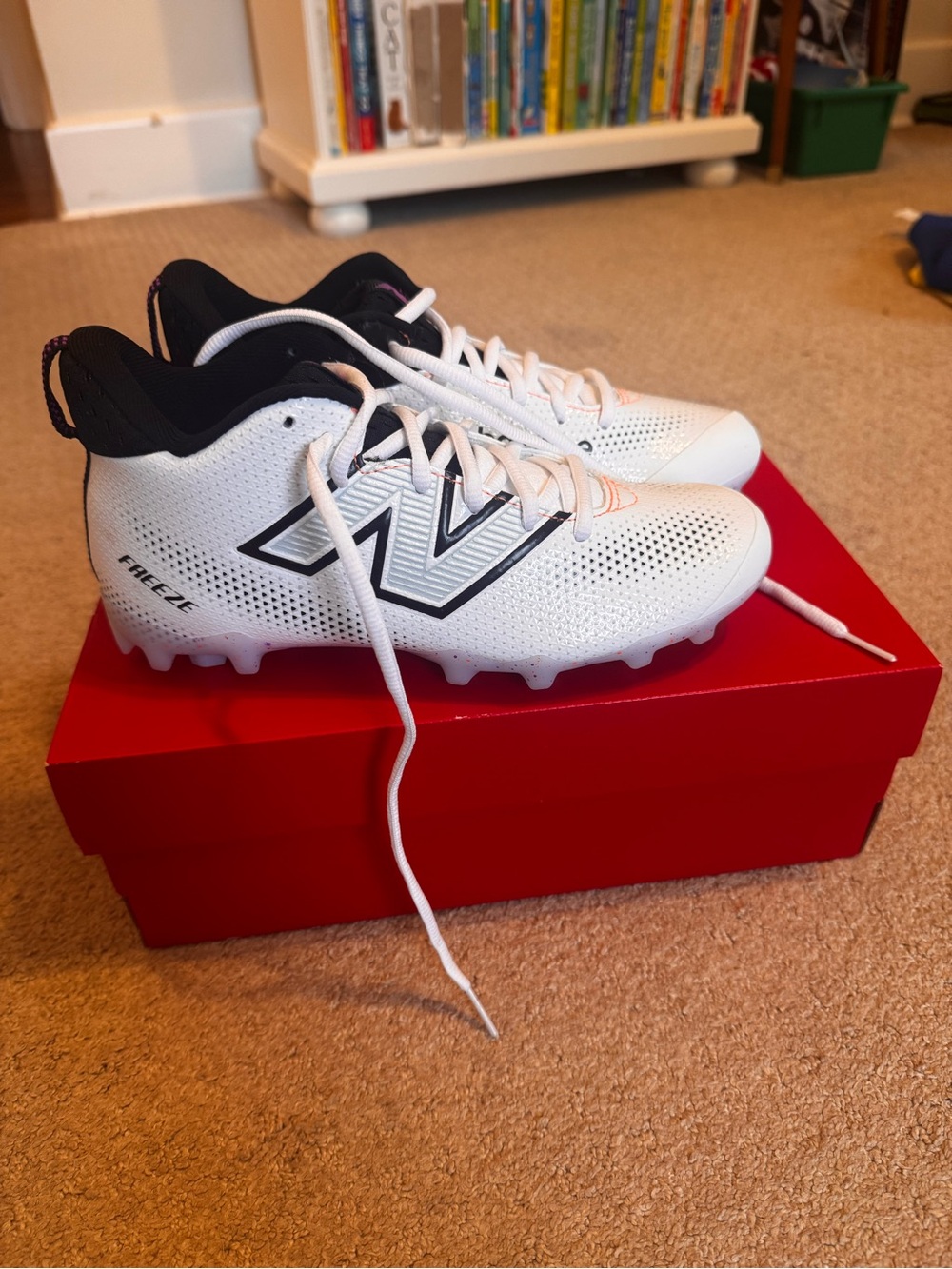 New Balance White and Black Kids Cleats